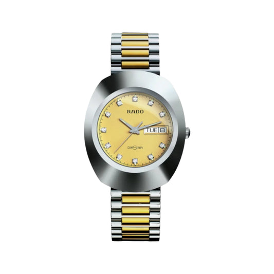 Silver and gold watch with diamond-studded face on a white background
