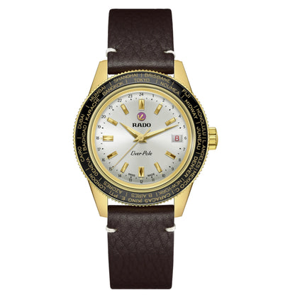 Rado watch with gold case and brown leather strap on a white background