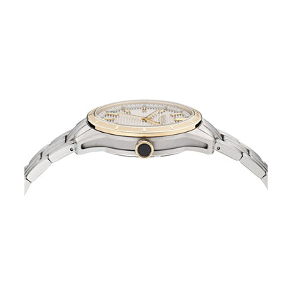 Watch with silver and gold case on a white background