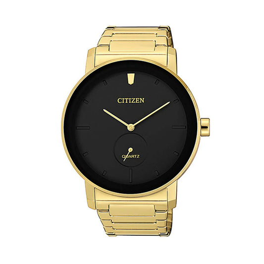 Gold watch with black face on a white background