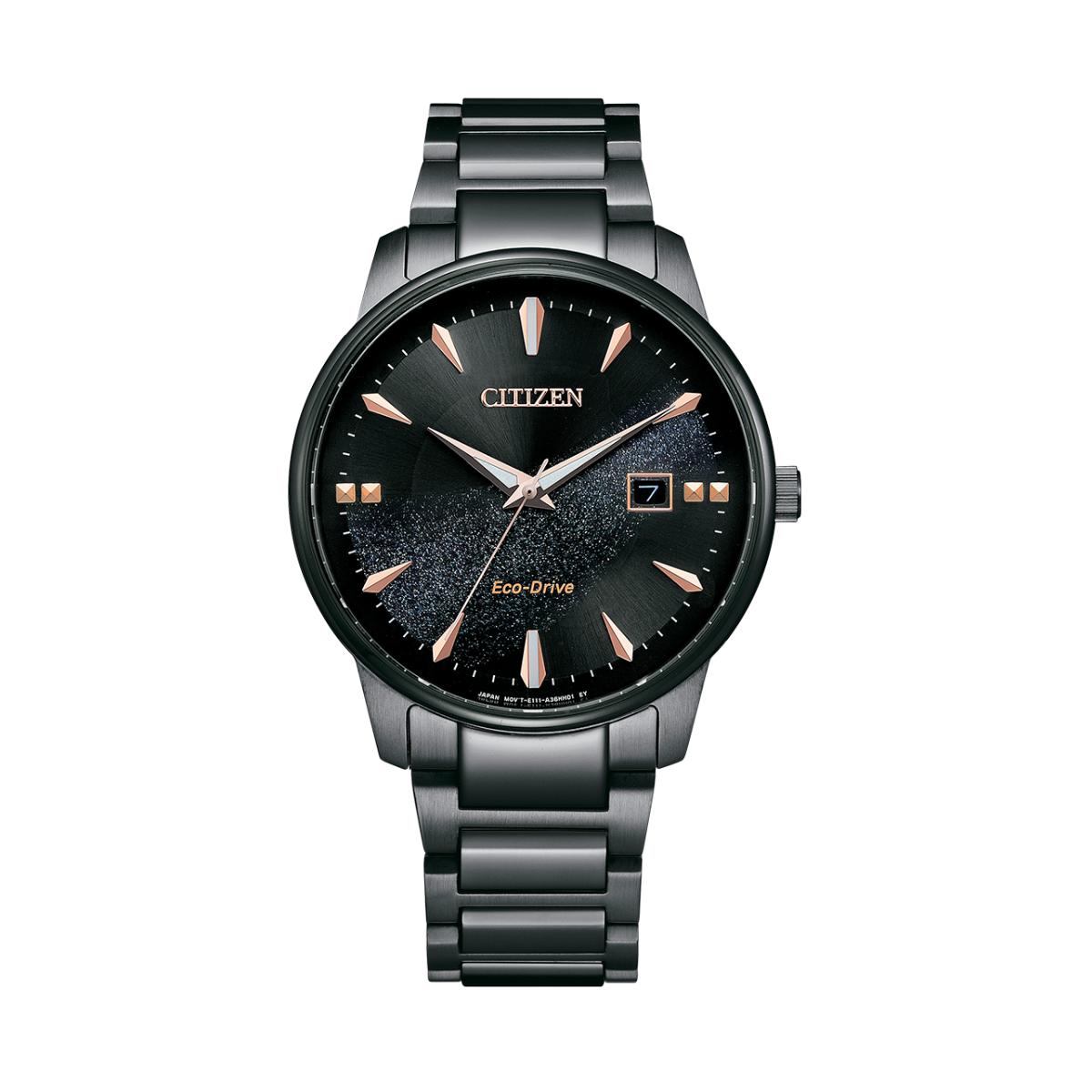 Citizen watch with black face and rose gold accents on a white background