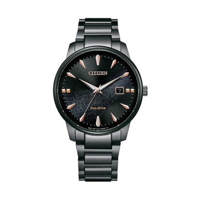 Citizen watch with black face and rose gold accents on a white background