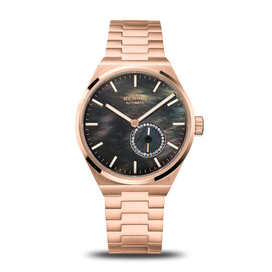 Rose gold watch with a detailed face on a white background