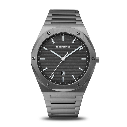 Gray wristwatch with 'BERING' brand on a white background