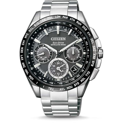 Citizen watch with silver metal band and black dial on a white background