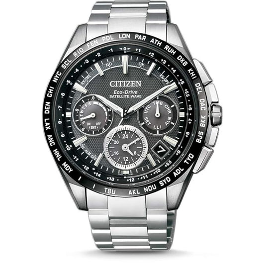 Citizen watch with silver metal band and black dial on a white background