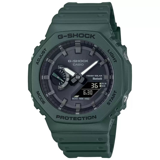 A green Casio G-SHOCK watch with an analog dial and a resin band.