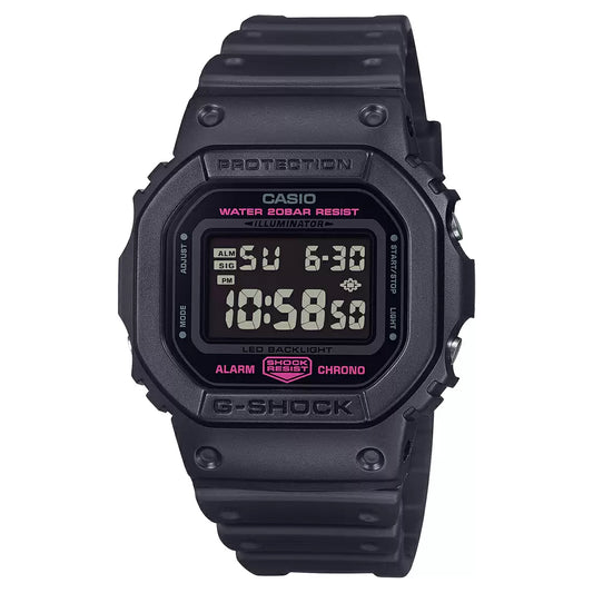 A digital Casio G-SHOCK watch with a black band and case, featuring a black dial with pink accents and the Pink Ribbon movement symbol.