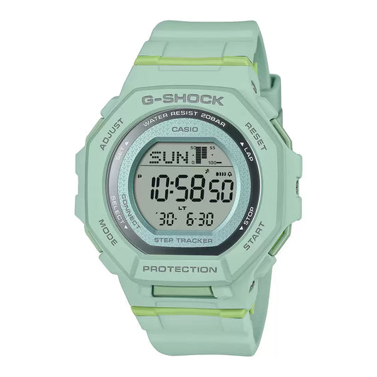 A green Casio G-SHOCK analog-digital watch with a digital display showing the time, date, and step tracker, set against a plain background.