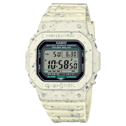 Digital watch with speckled pattern on a white background