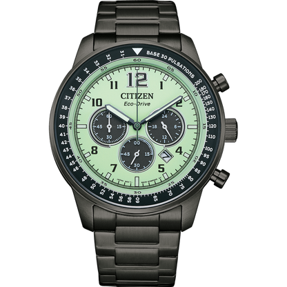 Citizen watch with green face and black strap on a white background