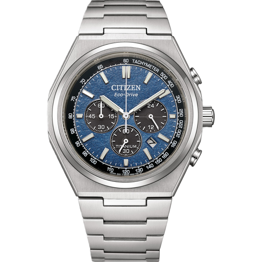 Silver Citizen watch with blue face on a white background