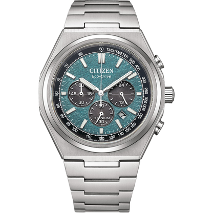 Silver Citizen watch with a blue face on a white background