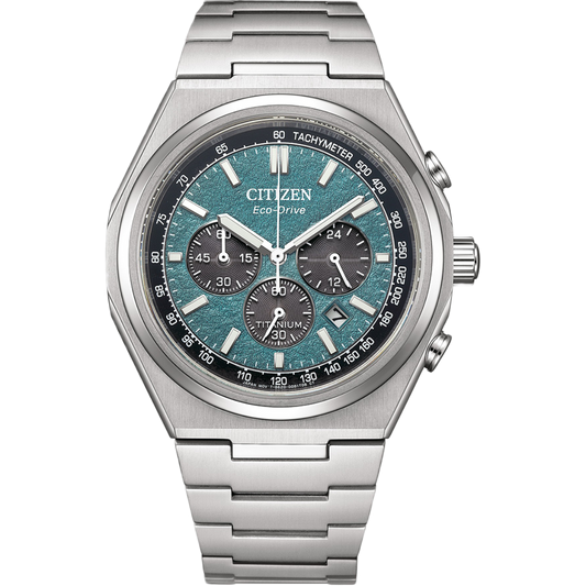Silver Citizen watch with a blue face on a white background