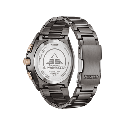 Silver Citizen Promaster watch with metal band on a white background