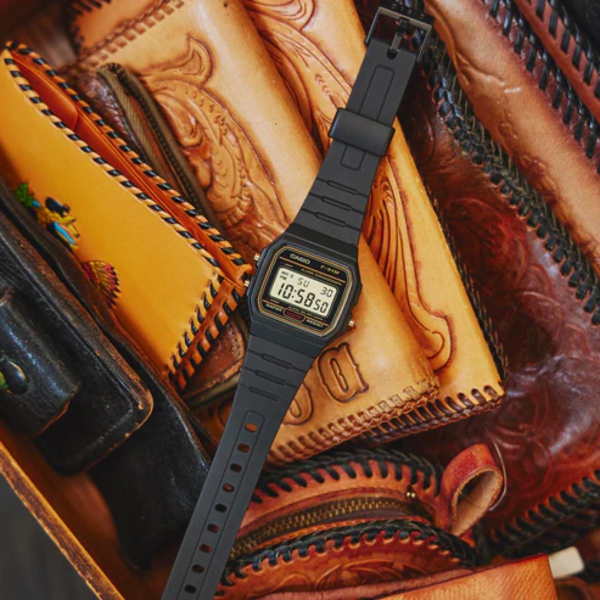 Casio digital watch on a background of leather goods