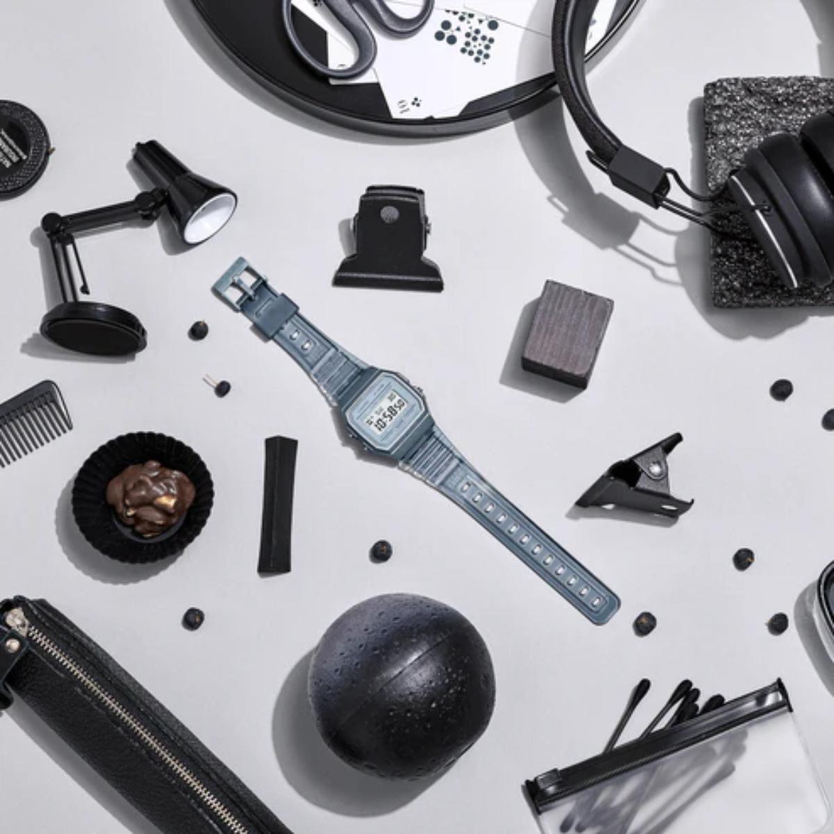 Collection of black and gray grooming products on a white background