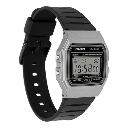 Casio digital watch with black strap on a white background