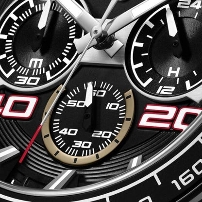 Close-up of a detailed watch face with black and white design elements.