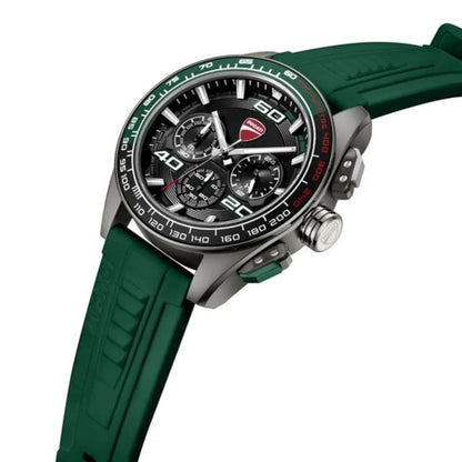 Green wristwatch with detailed face on a white background