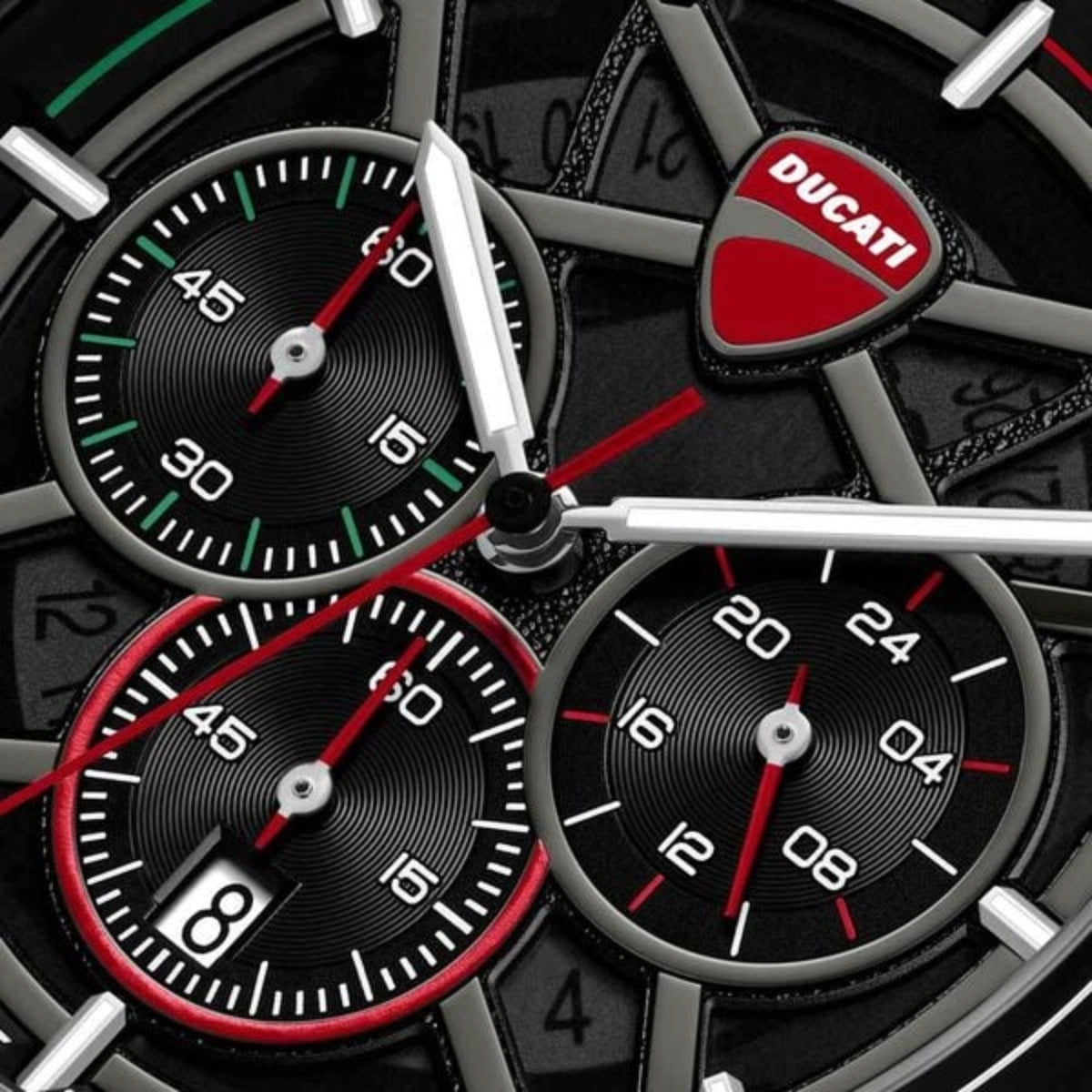 Close-up of a Ducati-branded watch with multiple dials.