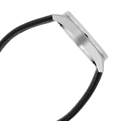 Close-up of a silver watch band with a black strap on a white background