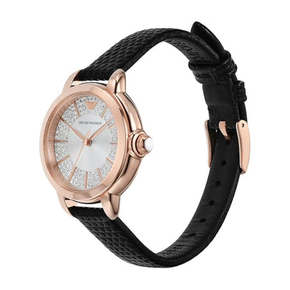 Watch with black strap and rose gold case on white background