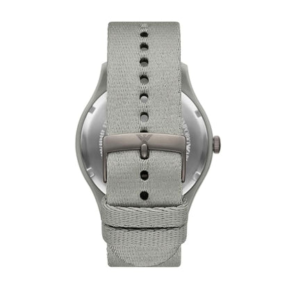 Gray watch with a textured strap on a white background