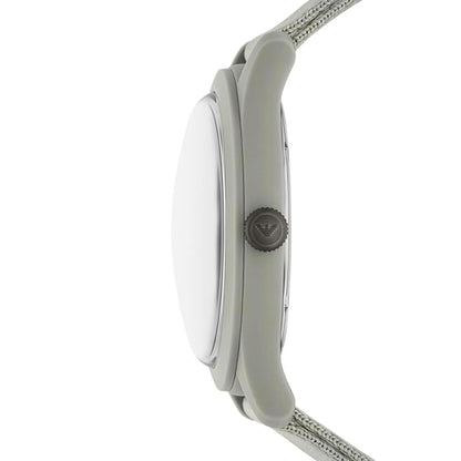 Close-up of a watch with a white face and gray strap on a white background