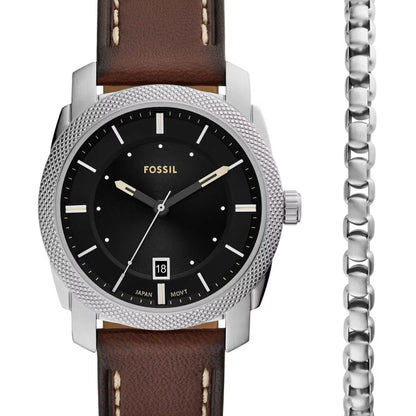 Fossil watch with brown leather strap and black dial on a white background
