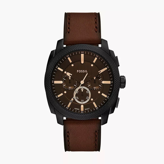 Fossil watch with brown leather strap on a white background