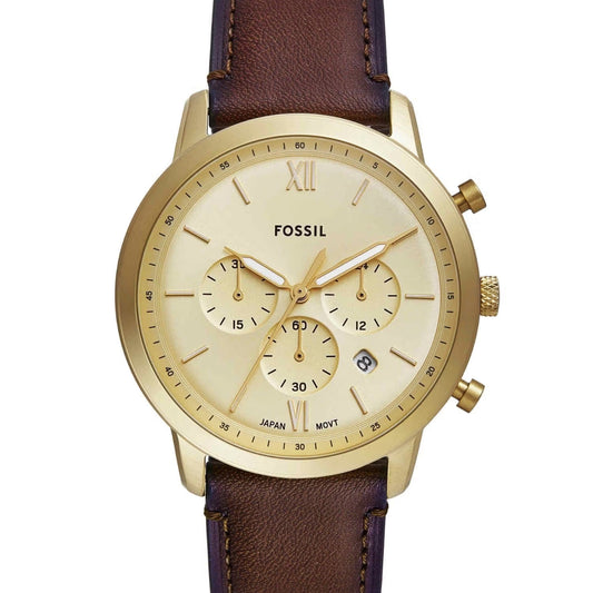 Fossil watch with gold face and brown leather strap on a white background