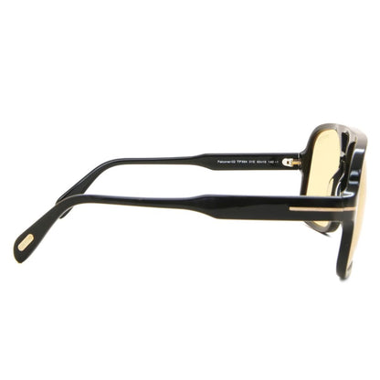 Black sunglasses with gold accents on a white background