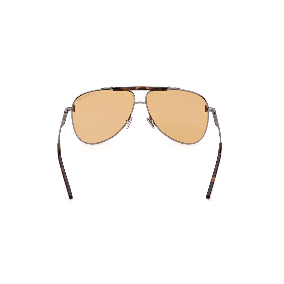 Aviator sunglasses with gold lenses and tortoiseshell frame on a white background