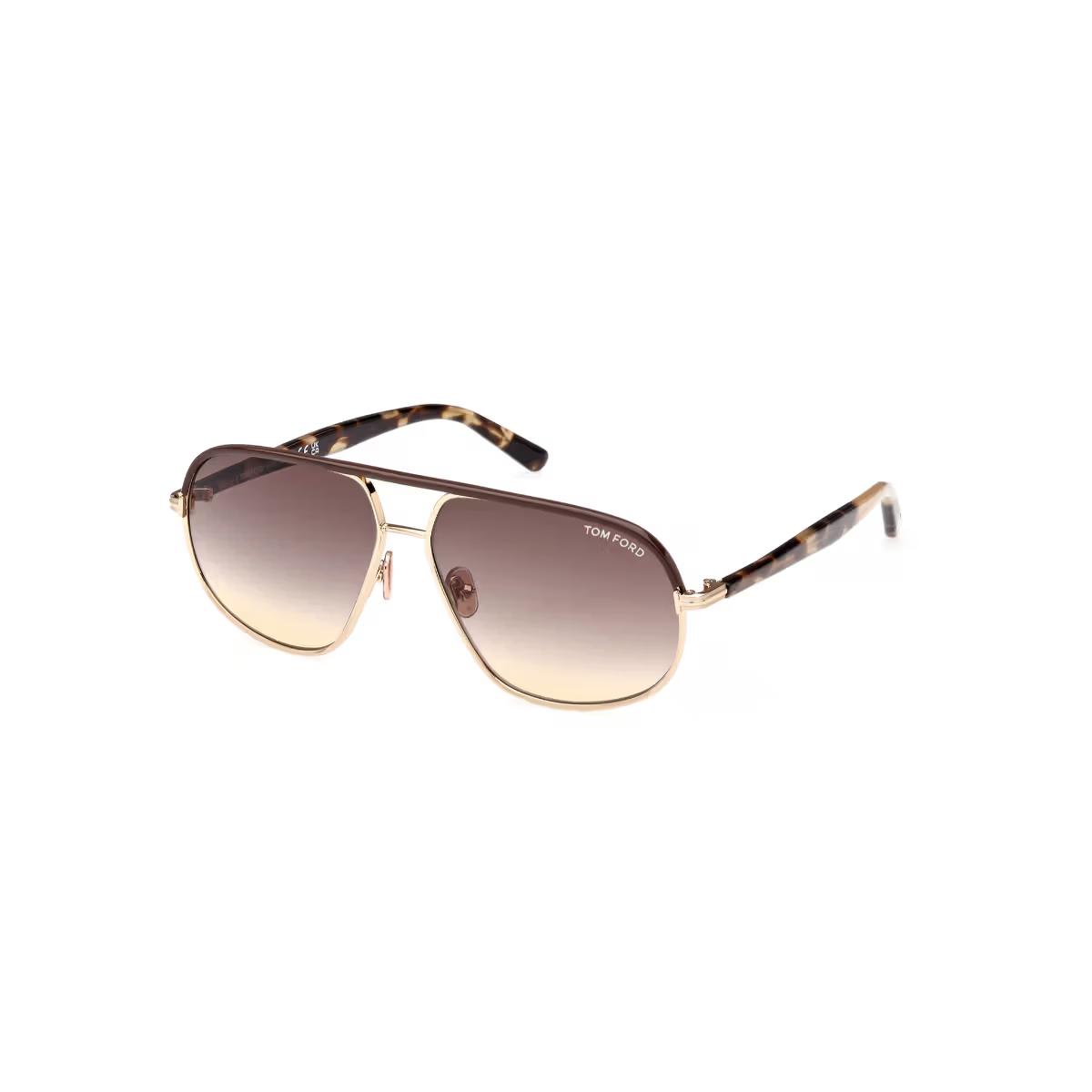 Sunglasses with gradient lenses and tortoiseshell frame on a white background