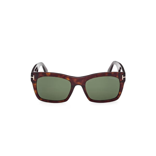 Sunglasses with tortoiseshell frame and green lenses on a white background