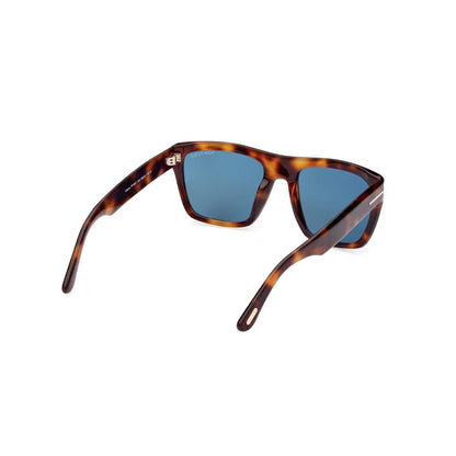 Sunglasses with tortoiseshell frame and blue lenses on a white background