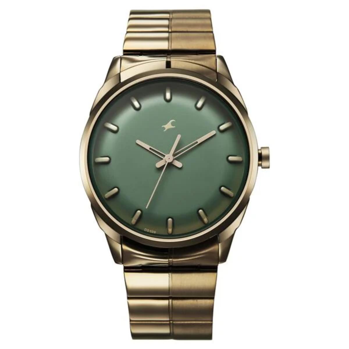 Gold watch with a green face on a white background