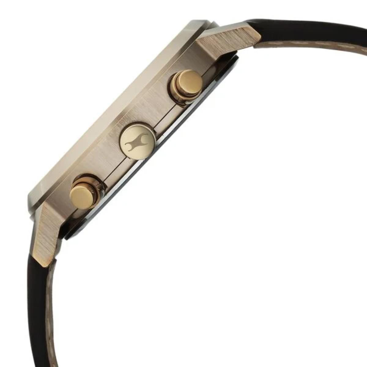 Close-up of a gold watch with black strap on a white background