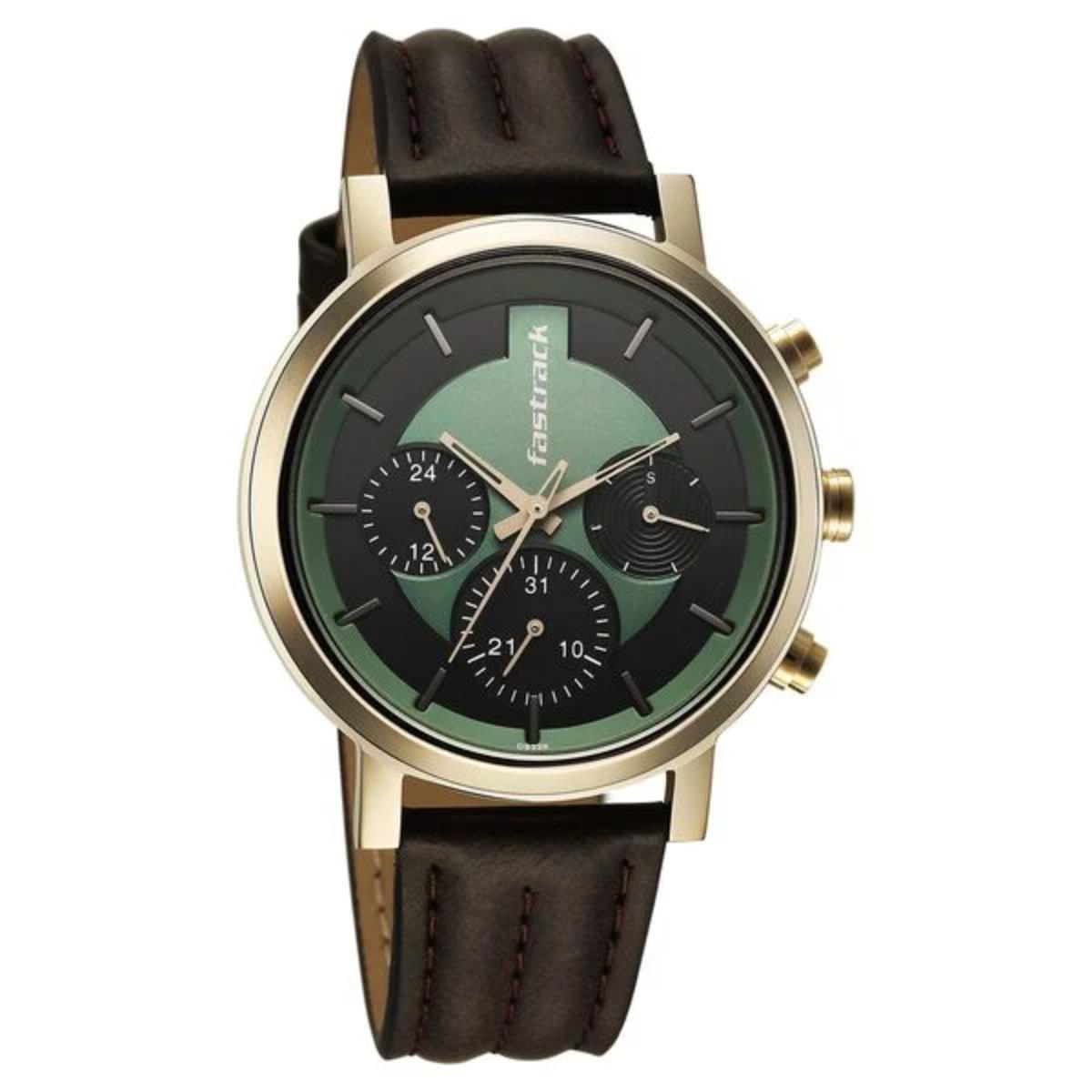 Wristwatch with brown leather strap and green dial on a white background
