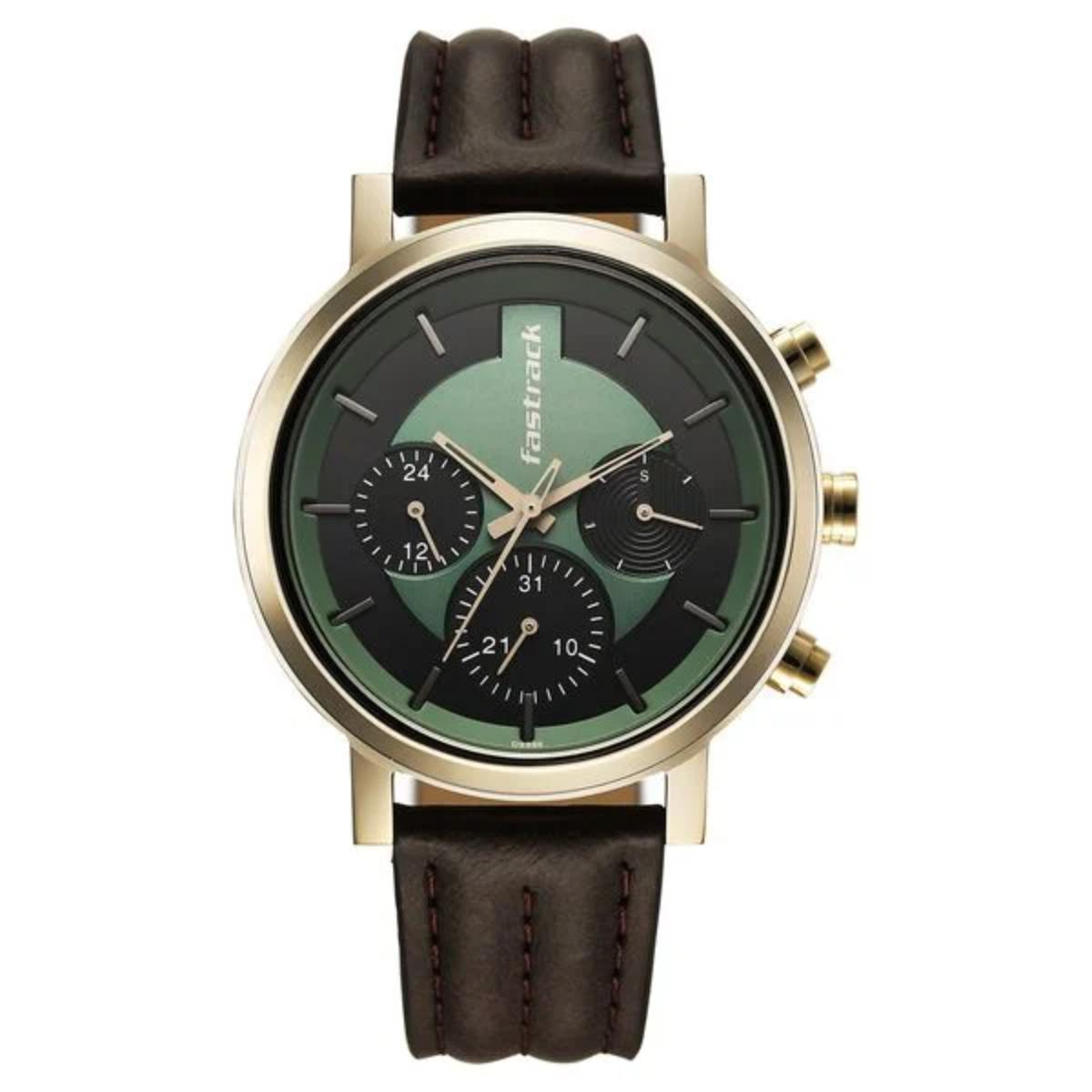 Wristwatch with brown leather strap and green face on white background