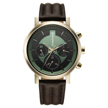 Wristwatch with brown leather strap and green face on white background