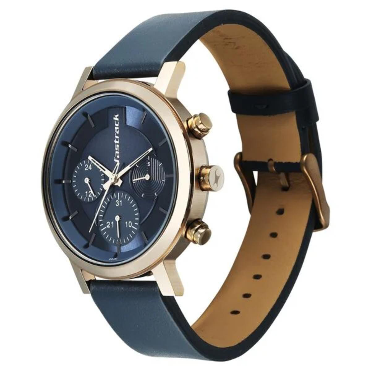 Wristwatch with blue strap and gold case on a white background