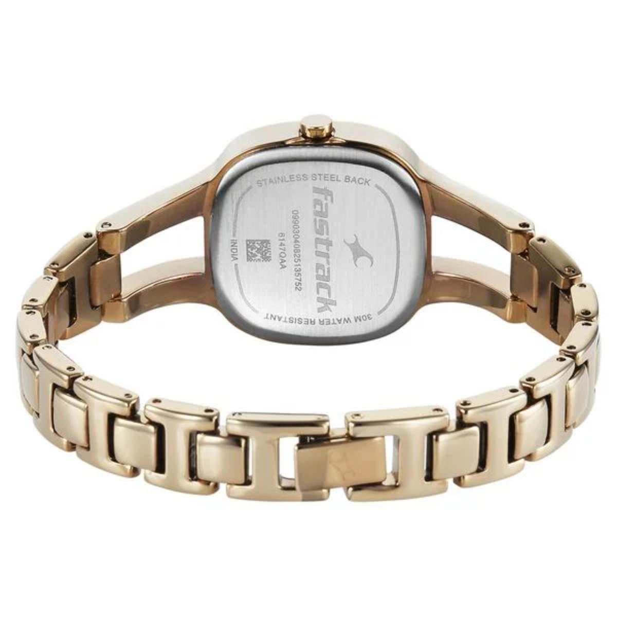 Rose gold watch with visible Fastrack branding on a white background