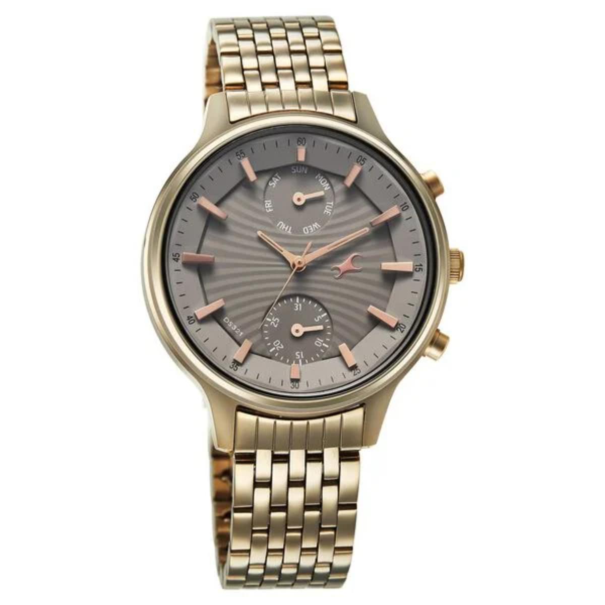 Gold wristwatch with a gray dial on a white background