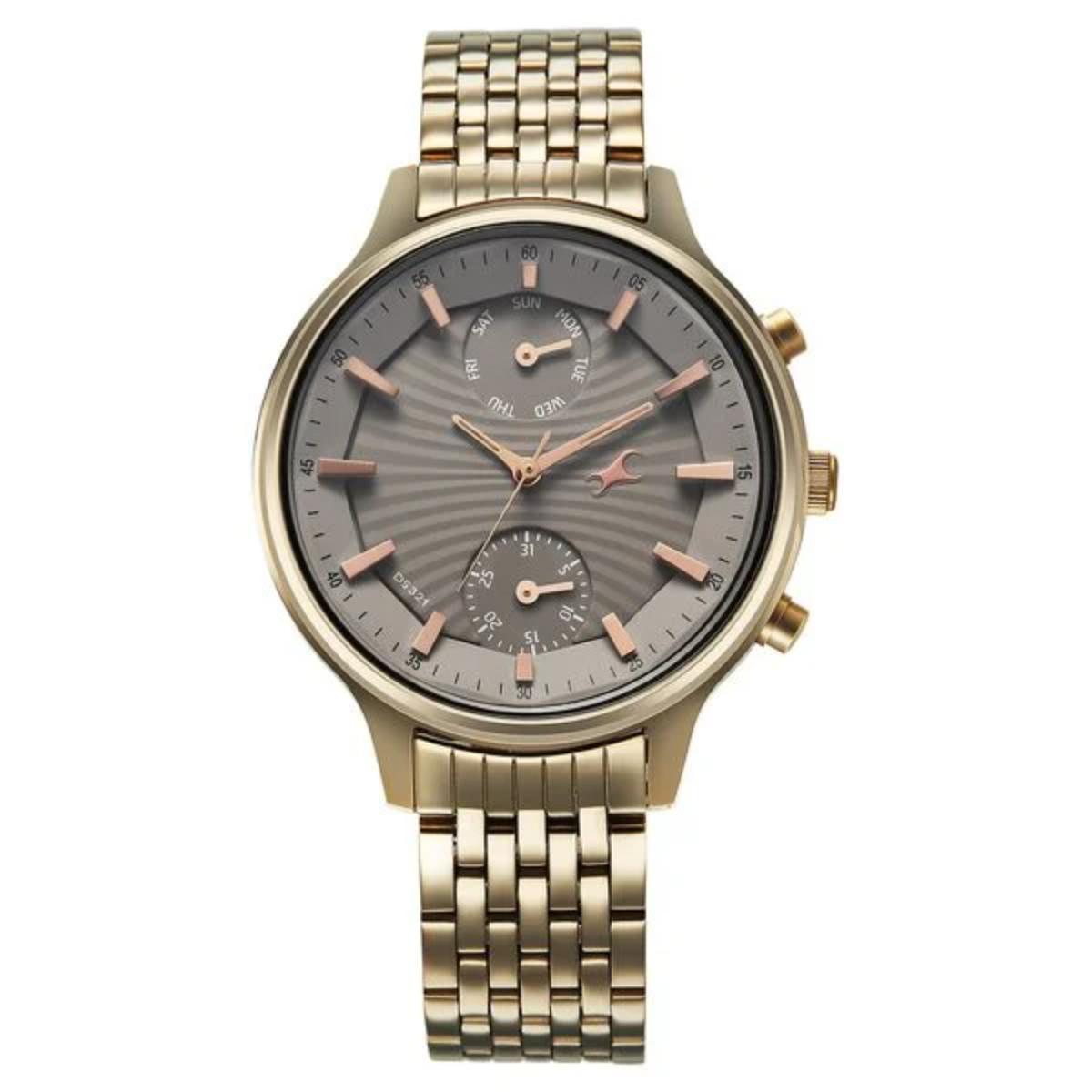 Gold watch with a detailed face on a white background