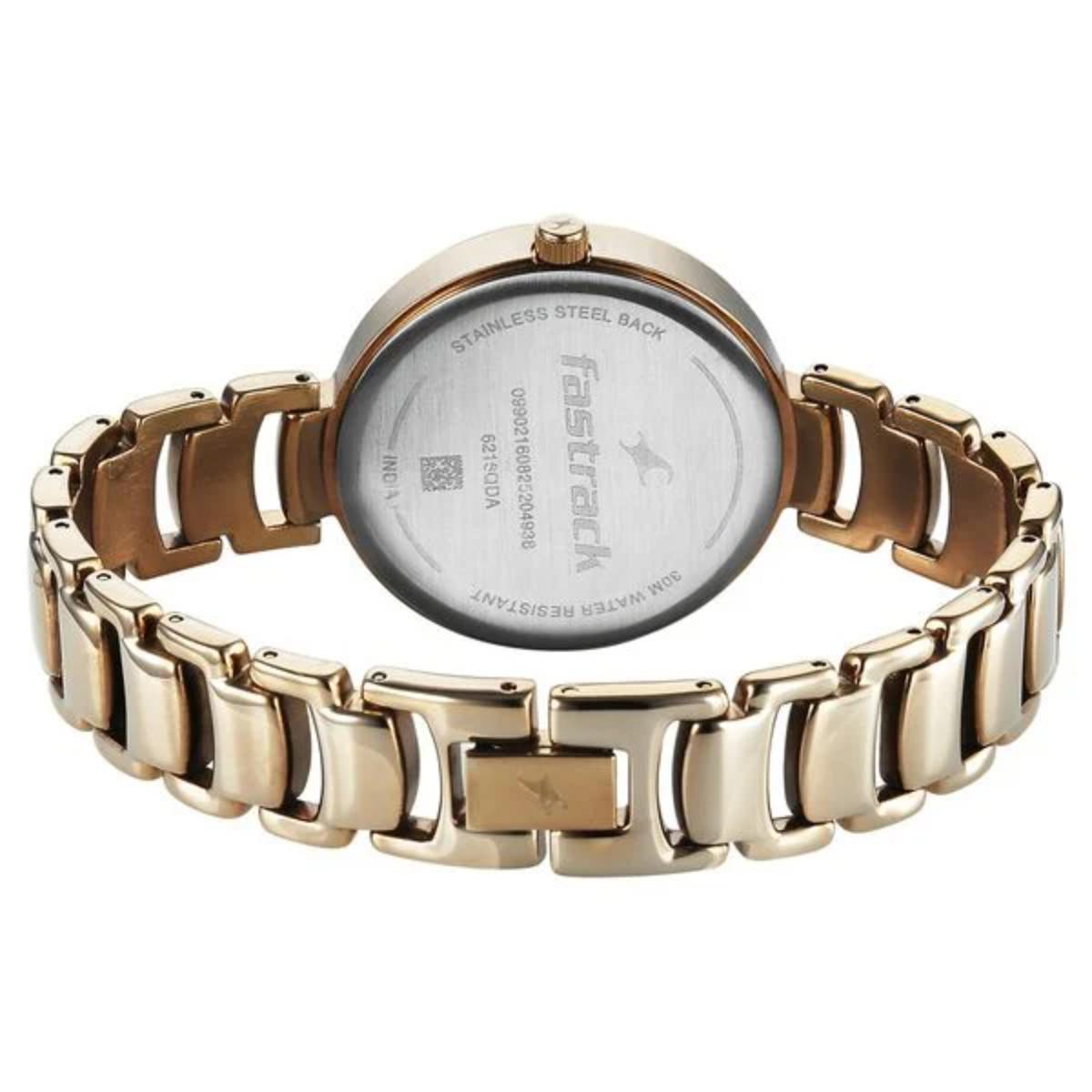 Rose gold watch with chain-like band on a white background