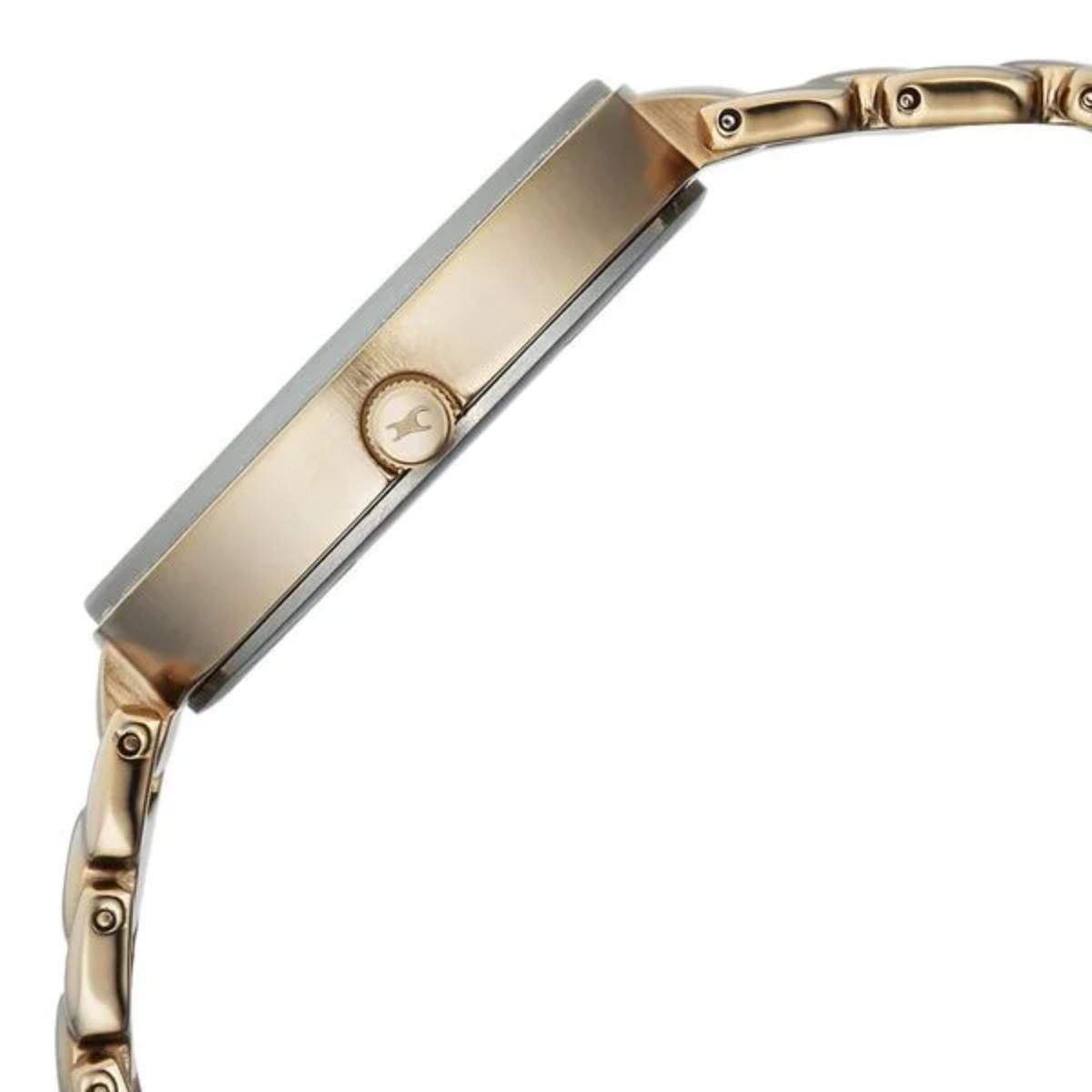 Gold watch with a white background