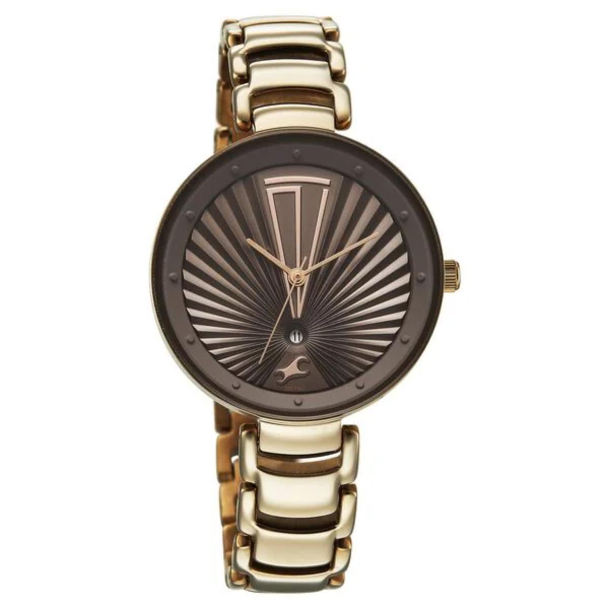 Gold and bronze watch with a unique face design on a white background