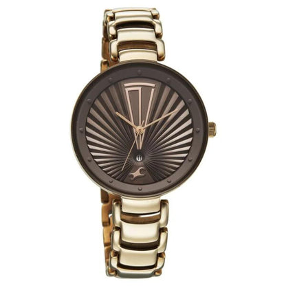 Gold and bronze watch with a unique face design on a white background